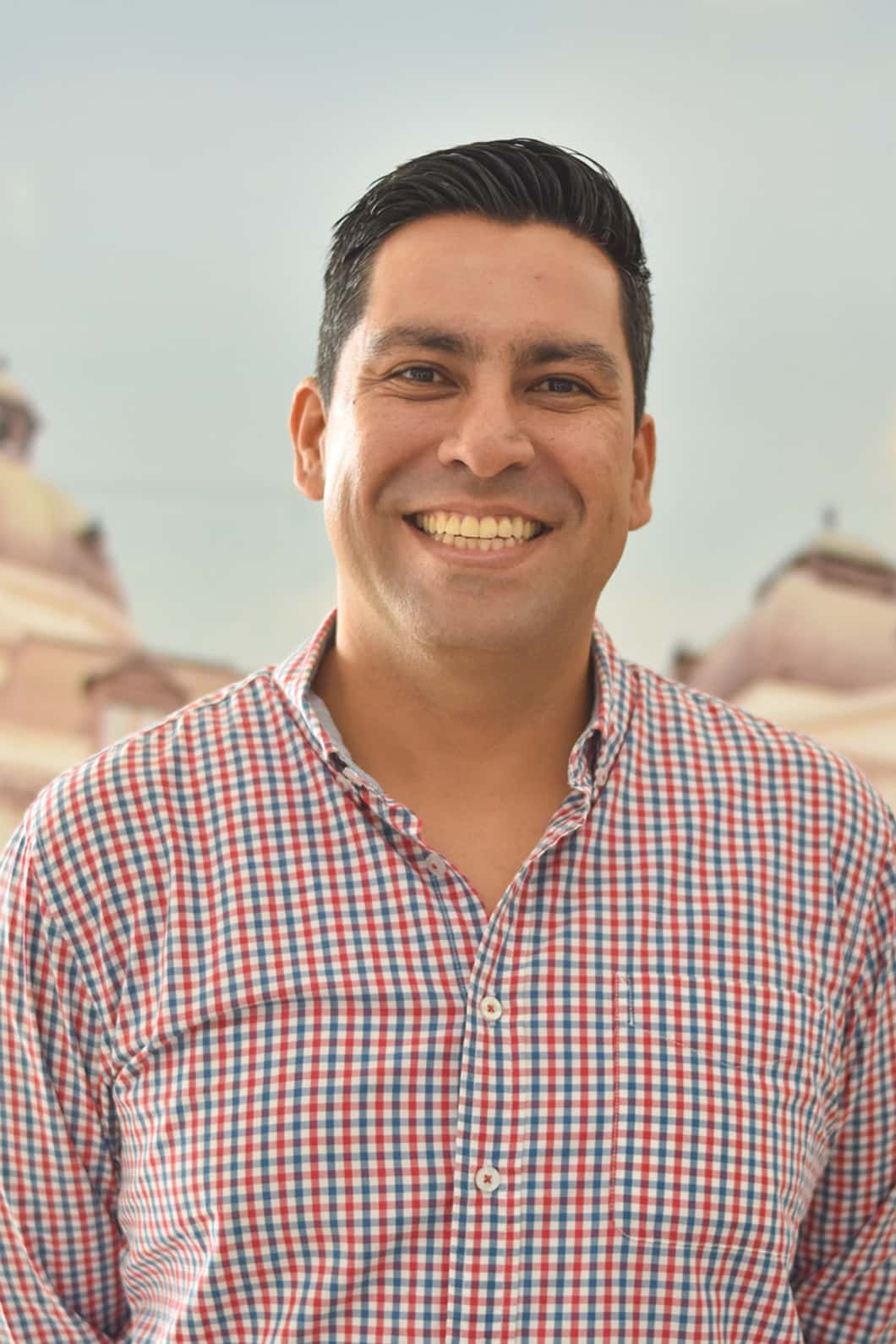 Foto de Daniel Parra, jefe de Evaluación de la Operación. Se encuentra de frente sonriendo.